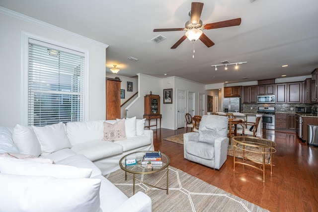 1607 Roustabout Way, Charleston, SC 29414 - living area featuring dark wood-style flooring, stairs, crown molding, and a ceiling fan