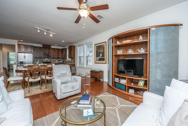 1607 Roustabout Way, Charleston, SC 29414 - living area featuring dark wood finished floors, ceiling fan, and crown molding