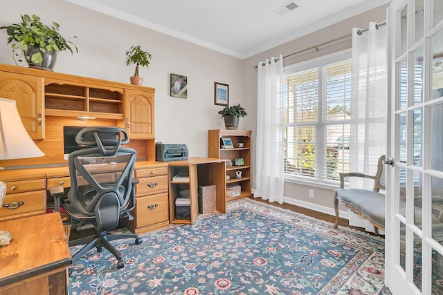 office area featuring visible vents, baseboards, and ornamental molding