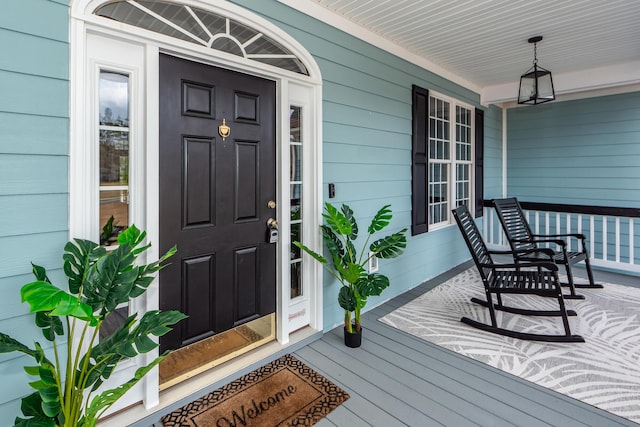 doorway to property with a porch