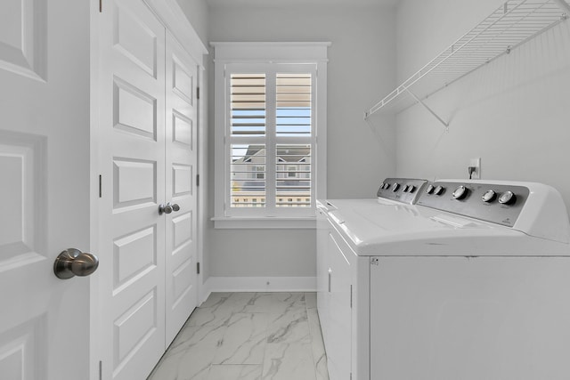 laundry area with washer and clothes dryer
