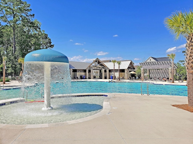 view of pool featuring pool water feature