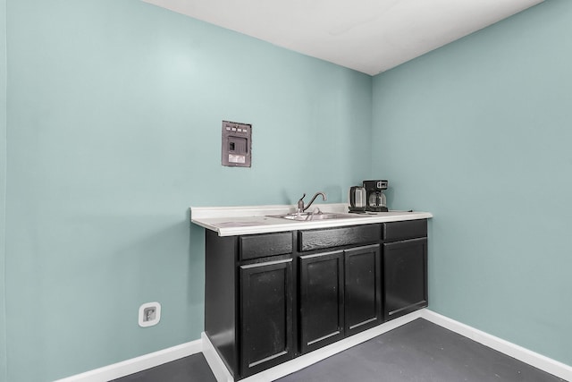 bathroom featuring vanity and concrete flooring