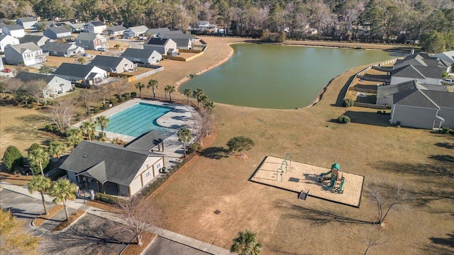 drone / aerial view featuring a water view