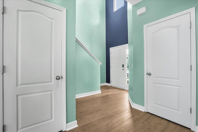 foyer entrance with hardwood / wood-style floors