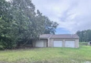 838 Ranch Hill Ln, Saint Stephen, SC 29479 - view of yard with a garage