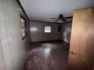 838 Ranch Hill Ln, Saint Stephen, SC 29479 - unfurnished room with wood finished floors and a ceiling fan