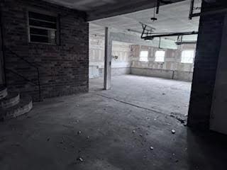 838 Ranch Hill Ln, Saint Stephen, SC 29479 - basement featuring a garage