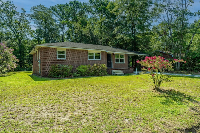 single story home featuring a front yard