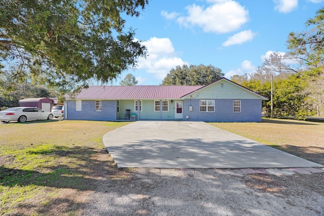 ranch-style house with a front yard