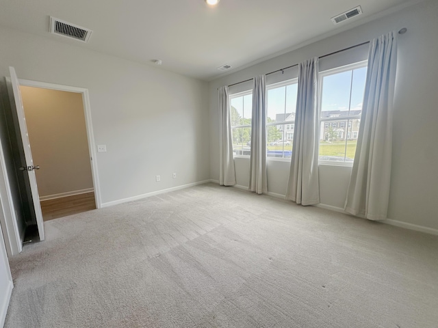1443 Central Ave, Summerville, SC 29483 - spare room featuring carpet floors and baseboards