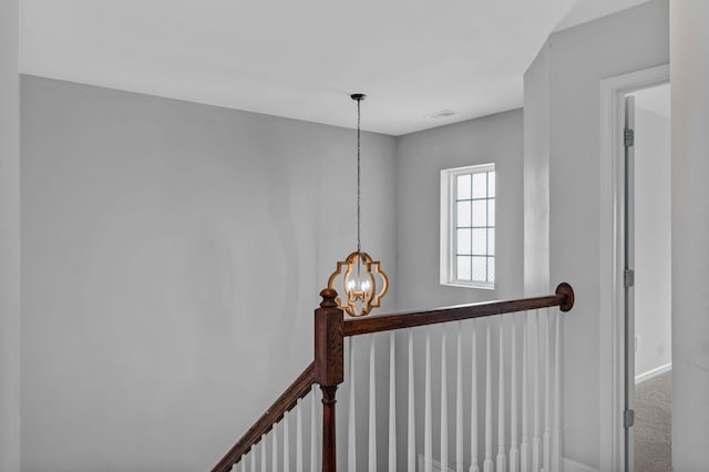 9923 Honeylocust Ln, Ladson, SC 29456 - detailed view of a chandelier and baseboards