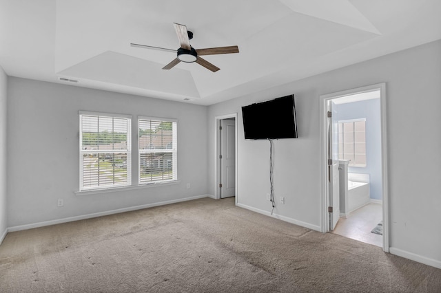 9923 Honeylocust Ln, Ladson, SC 29456 - unfurnished bedroom featuring a tray ceiling, carpet, and baseboards
