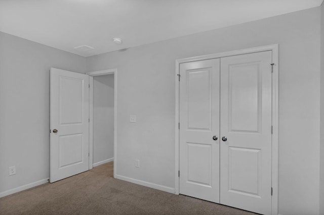 9923 Honeylocust Ln, Ladson, SC 29456 - unfurnished bedroom with carpet floors, a closet, and baseboards