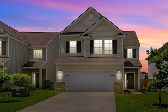 9923 Honeylocust Ln, Ladson, SC 29456 - traditional-style house featuring concrete driveway, an attached garage, a lawn, and stone siding