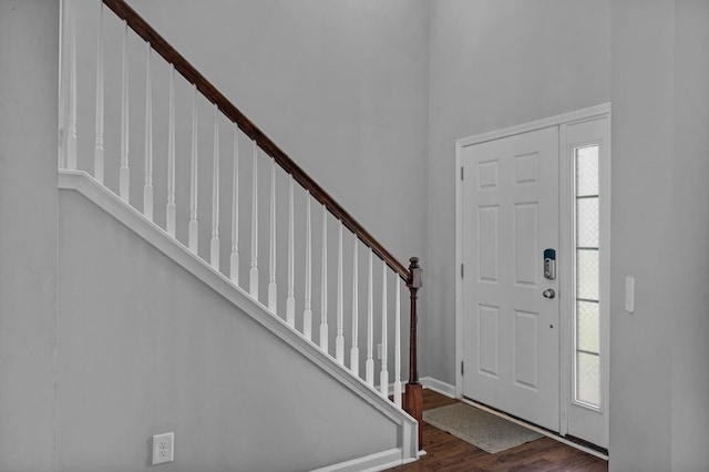 9923 Honeylocust Ln, Ladson, SC 29456 - foyer featuring dark wood-style flooring, stairs, and a towering ceiling