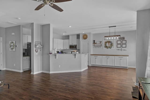 9923 Honeylocust Ln, Ladson, SC 29456 - living area with ceiling fan, dark wood-type flooring, baseboards, and recessed lighting