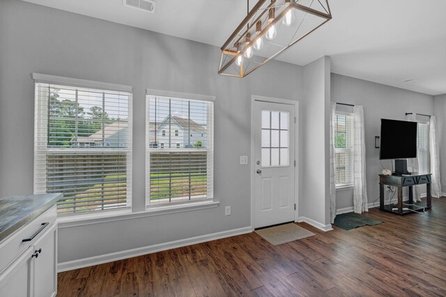 9923 Honeylocust Ln, Ladson, SC 29456 - entrance foyer with dark wood-style floors and baseboards