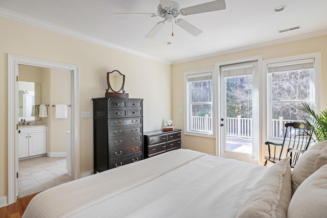 bedroom featuring access to exterior, visible vents, ornamental molding, ensuite bath, and baseboards