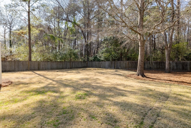 view of yard with fence