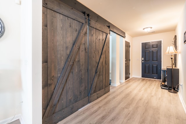 137 Salem Creek Dr, Goose Creek, SC 29445 - entrance foyer with wood finished floors and a barn door
