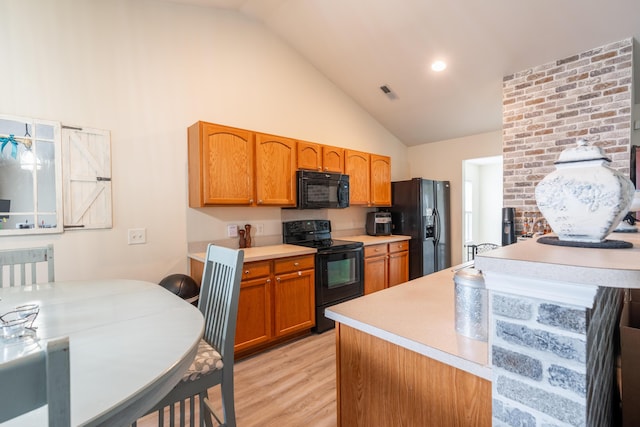 137 Salem Creek Dr, Goose Creek, SC 29445 - kitchen with black appliances, light wood-style floors, high vaulted ceiling, light countertops, and brown cabinets