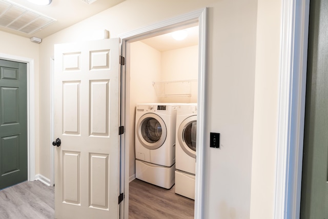 137 Salem Creek Dr, Goose Creek, SC 29445 - washroom with washing machine and dryer and light wood-style flooring