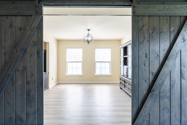 137 Salem Creek Dr, Goose Creek, SC 29445 - interior space with wood finished floors and a barn door