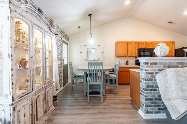 137 Salem Creek Dr, Goose Creek, SC 29445 - dining area featuring vaulted ceiling and light wood-type flooring