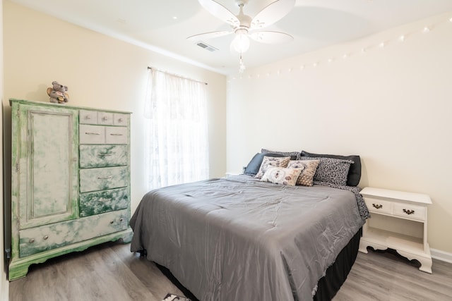 137 Salem Creek Dr, Goose Creek, SC 29445 - bedroom with light wood finished floors and a ceiling fan