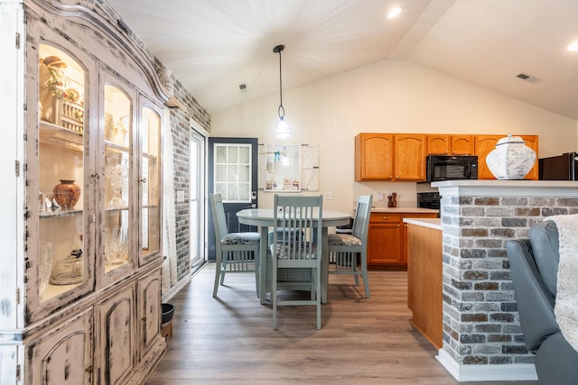 137 Salem Creek Dr, Goose Creek, SC 29445 - dining area featuring lofted ceiling and light wood-style flooring