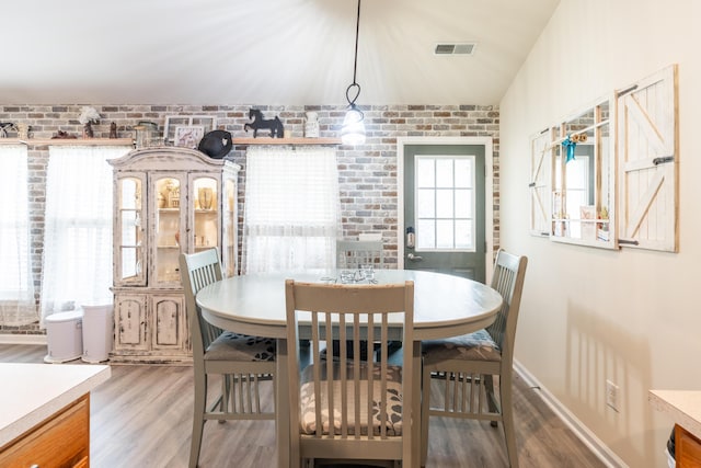 137 Salem Creek Dr, Goose Creek, SC 29445 - dining space featuring wood finished floors and brick wall