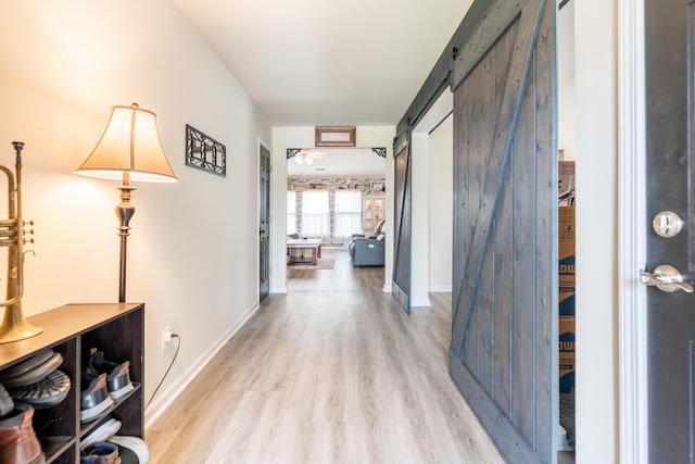 137 Salem Creek Dr, Goose Creek, SC 29445 - corridor featuring wood finished floors and a barn door
