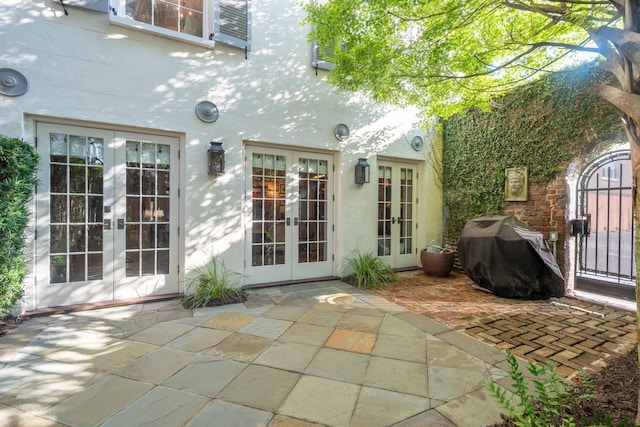 exterior space featuring a patio and french doors