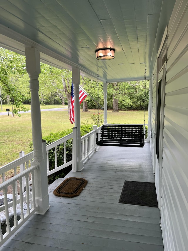 5924 Wagener Rd, Wagener, SC 29164 - wooden porch featuring a lawn