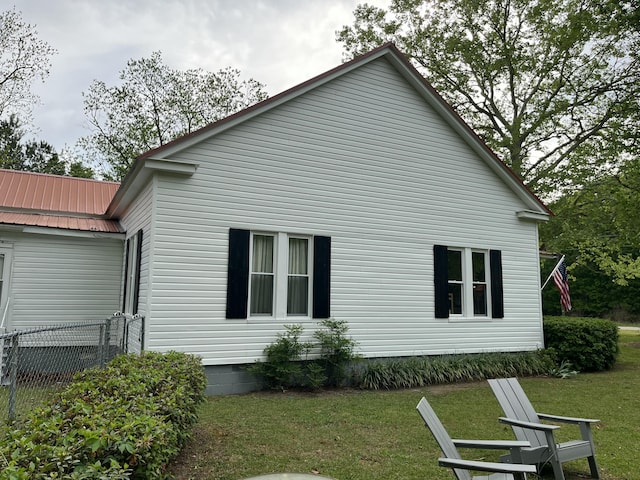 5924 Wagener Rd, Wagener, SC 29164 - view of home's exterior featuring metal roof and crawl space