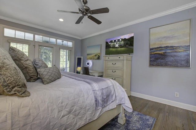 bedroom with ornamental molding, dark wood-style flooring, a ceiling fan, and baseboards