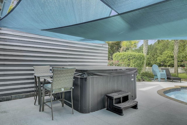 view of patio featuring a hot tub