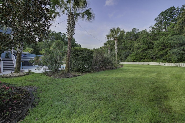 view of yard with fence