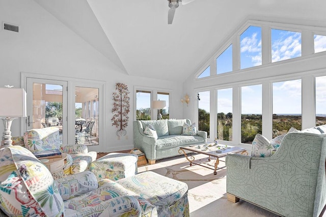 sunroom with visible vents and vaulted ceiling