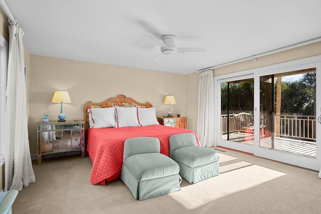 carpeted bedroom featuring access to exterior and ceiling fan