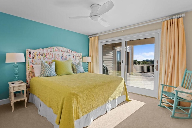 carpeted bedroom featuring ceiling fan, access to outside, and baseboards