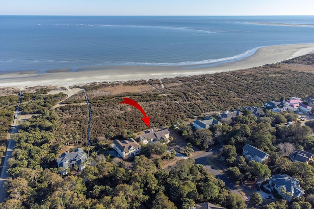 bird's eye view featuring a beach view and a water view