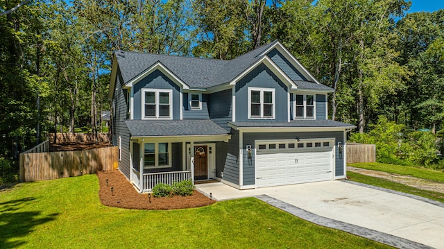 craftsman-style house with a front lawn, a porch, and a garage