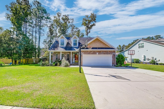 view of front of home featuring a front yard and a garage