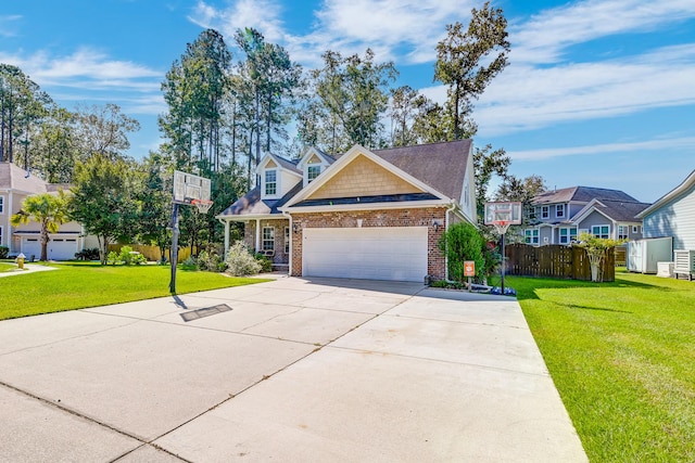 view of front of house featuring a front yard and a garage