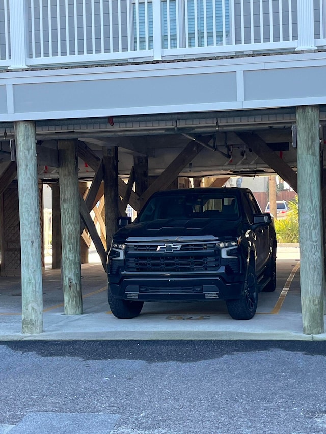 view of parking with a carport