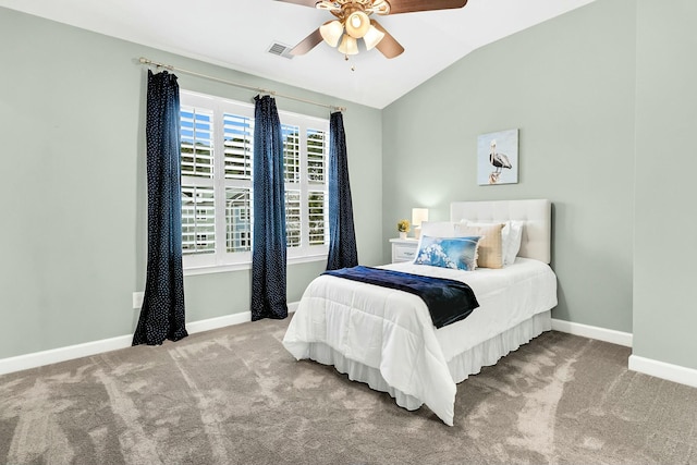 bedroom featuring carpet, ceiling fan, and vaulted ceiling