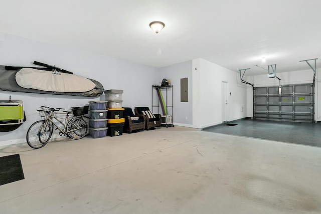 garage featuring a garage door opener and electric panel