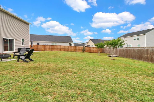 view of yard featuring a fire pit